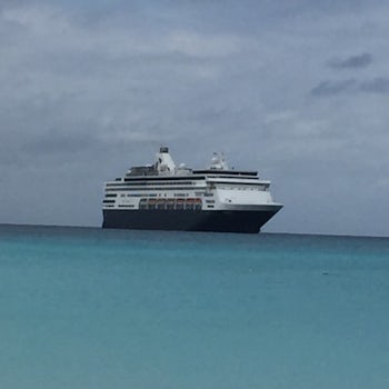 Long shot of ship in distance when were on the beach at Half Moon Cay.