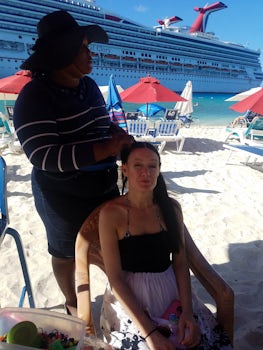 Getting my hair braided by a local in Grand Turk. They do not take No for a