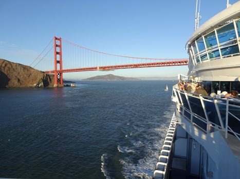 Ship sailing under Golden Gate Bridge (windy and cold, so be prepared)