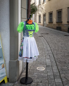 German dirndl on display outside a shop in captivating Bamberg, Germany.