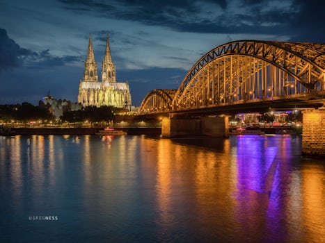 Night view of the Cologne Cathedral and the Hohenzollern Bridge over the Rh