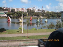 Seven Afro/Brazilian Saint Statues floating on the lake in centre of Salvad