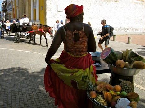 Fruit vendor and starved horse in Cartagena's old city.