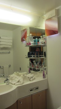 Concierge C2 cabin - Bathroom shelves.  Note the top shelf has enough room