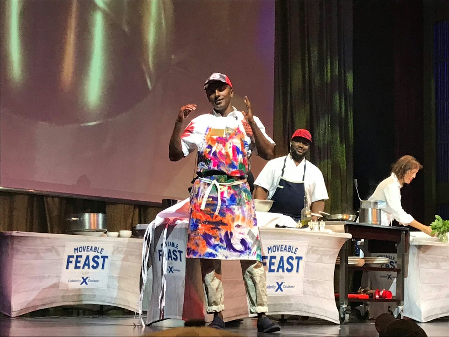 Marcus Samuelsson cooking for 'Moveable Feast' activity onboard