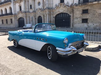 Old car behind the cathedral in Havana