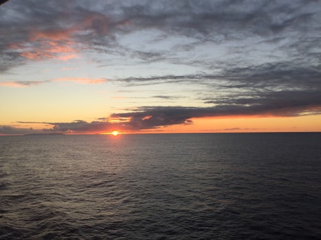 View of sunset off Na'apali Coast on last night of cruise.  Saw several