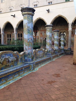 Visiting a very old monastery in Naples. Beautiful inlaid mosaic benches an