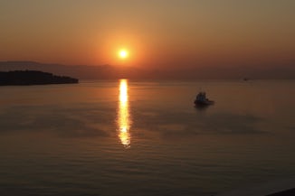 This is a photo of the sunrise as we sailed into Corfu, Greece.