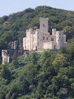 Castle on a hill as viewed from the river. Germany