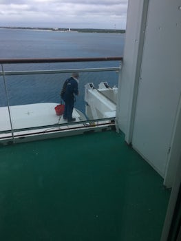 One of the crew doing maintenance outside our balcony