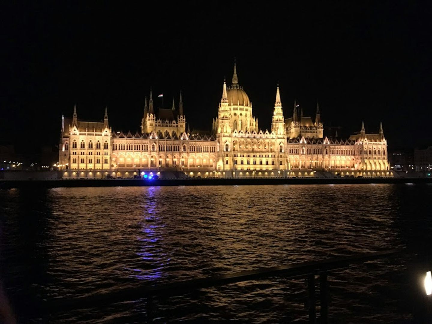 Parliament Building lit up along the Danube, entering Budapest Hungary. Thi