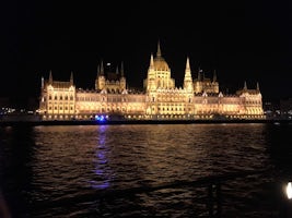 Parliament Building lit up along the Danube, entering Budapest Hungary. Thi