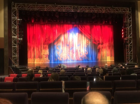 The opening curtain for We Will Rock You!