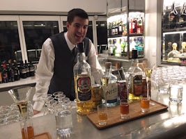 Our bartender conducting a tasting of Aquavit and Norwegian Beer.