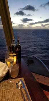 Our gorgeous view of the bow of the boat and sunset at LaCucina