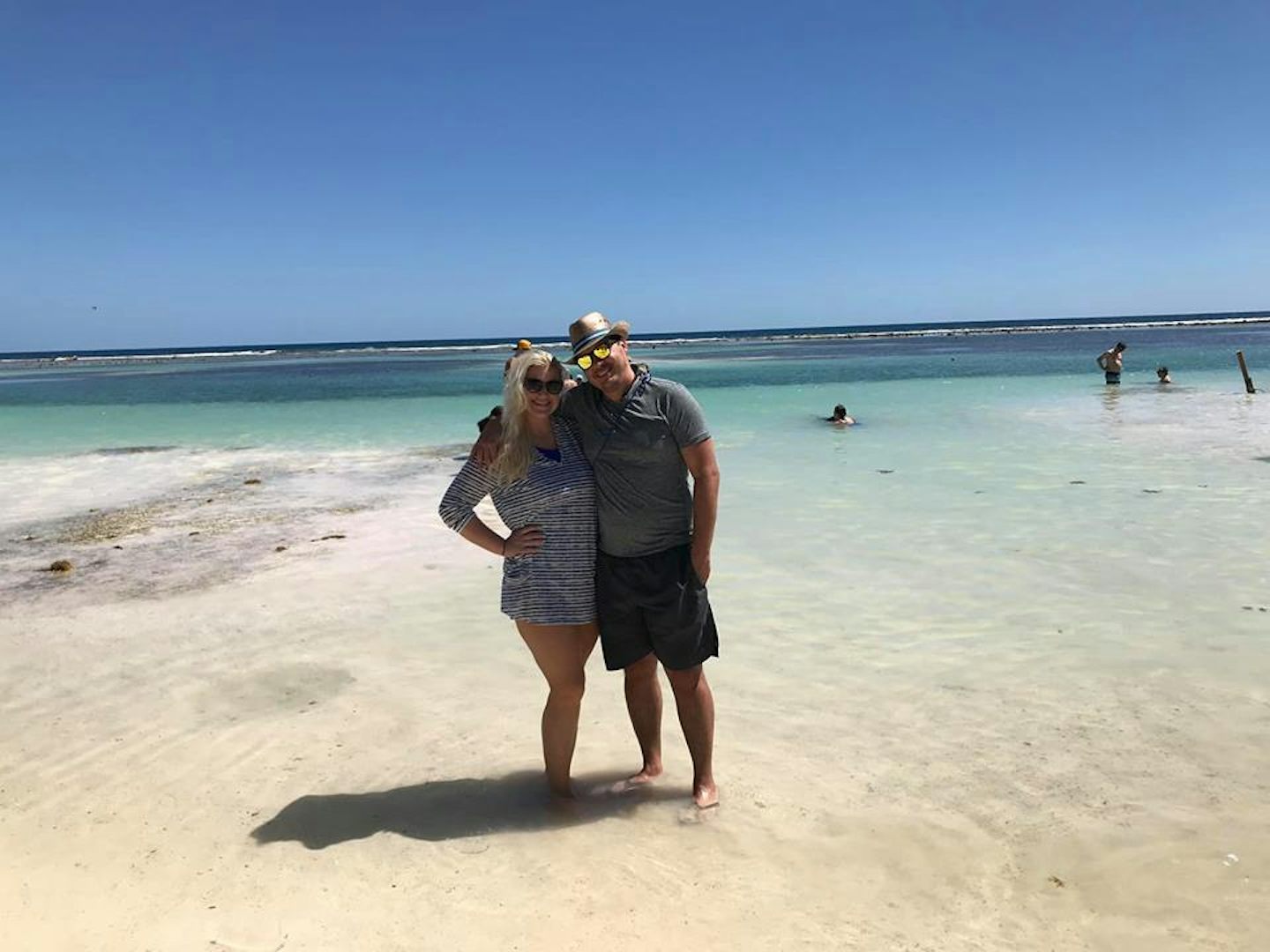 me and my husband at the beach at costa maya
