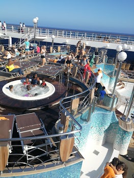 Top deck of the ship containing hot tub and pools. 