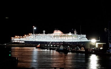Astoria berthed at night in Poole