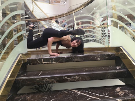 Me doing arm balance on the golden stairwell 
