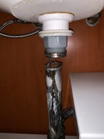 Disconnected pipe in bathroom sink