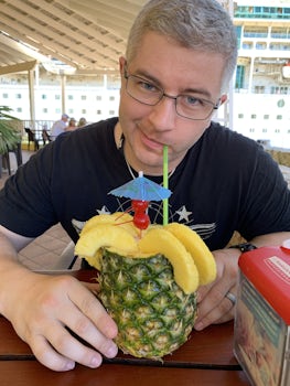 Hubby with a yummy drink in Roatan 