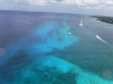 Beautiful Cozumel water viewed from parasail at Nachi Cocom