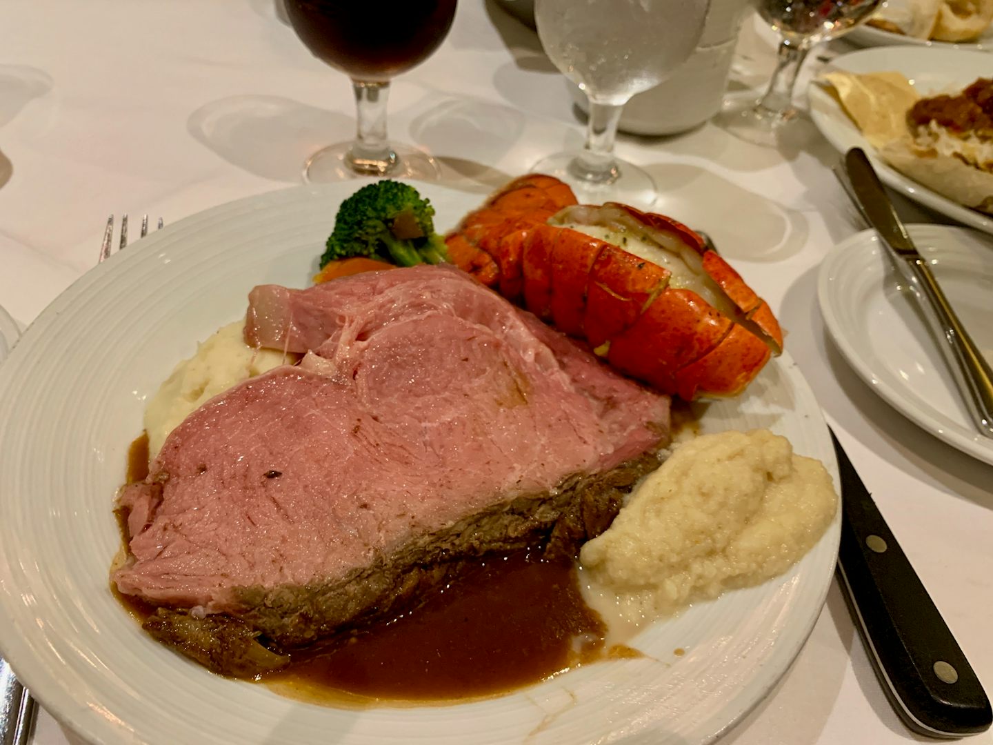 Prime rib (I order mine rare) and lobster in the main dining room on formal