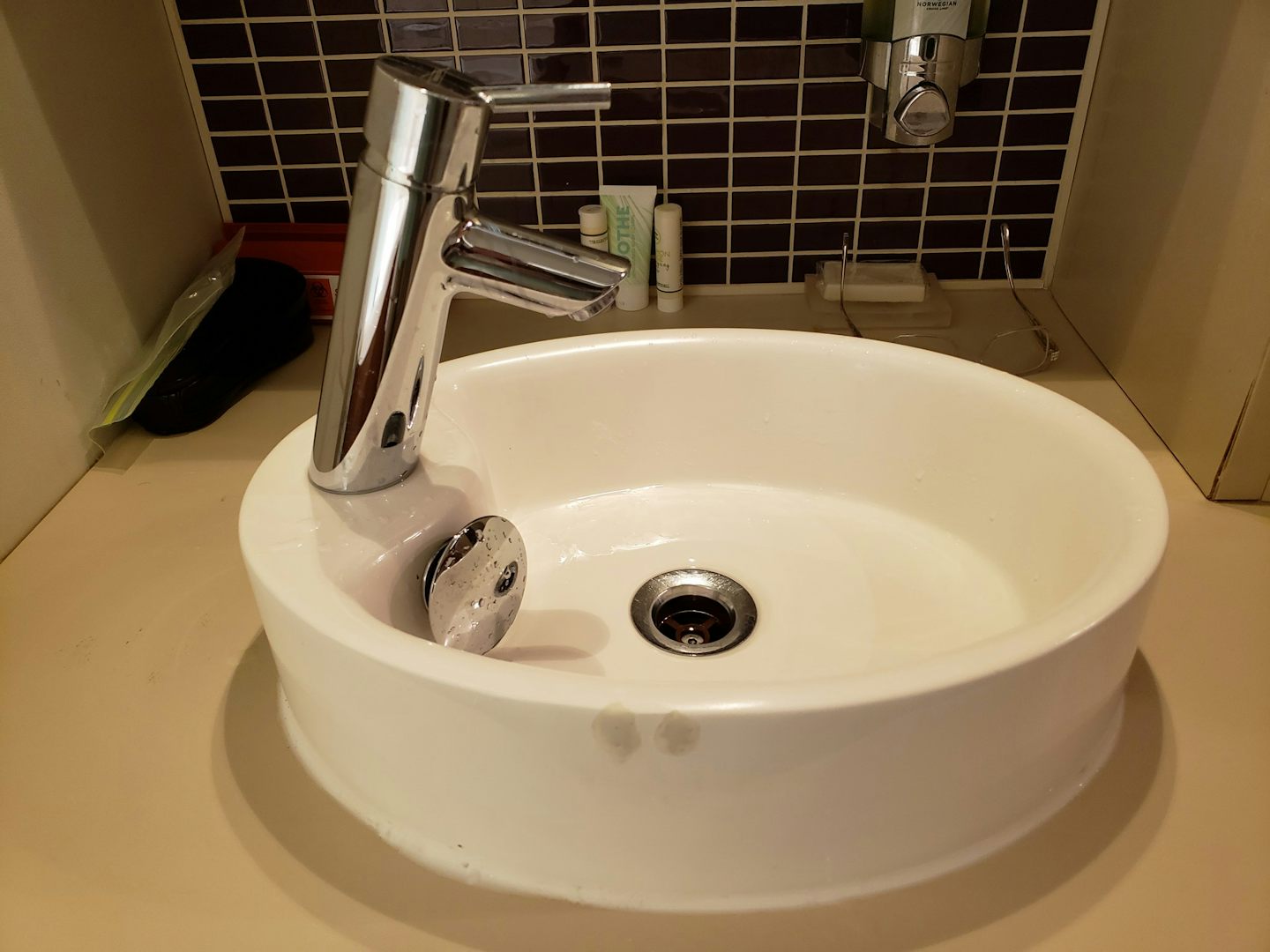 This sink is so small and the faucet takes up 1/3 of the width. No way to a