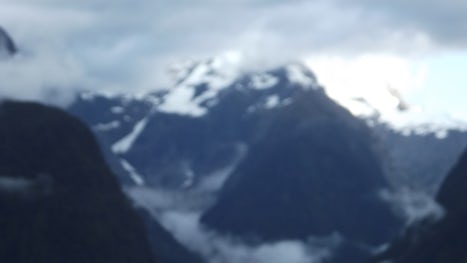 Snow capped peaks in Milford Sound