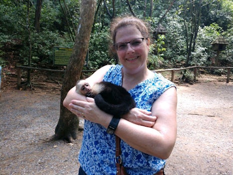 Holding a baby monkey at the preserve