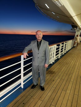 My sexy husband on the first elegant night. Deck 3, also a smoker.