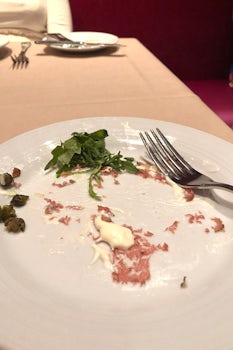 Carpaccio got glued to the plate. Also, tasted like glue.