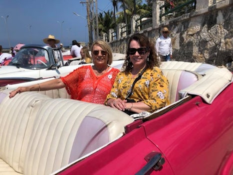 Car ride in a 1952 Ford convertible with a Honda engine in Havana.