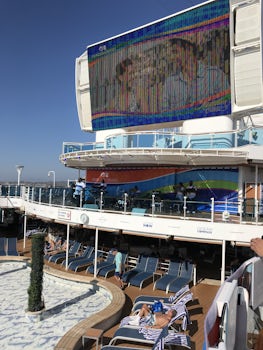 Big television screen on deck 16 by the pool area