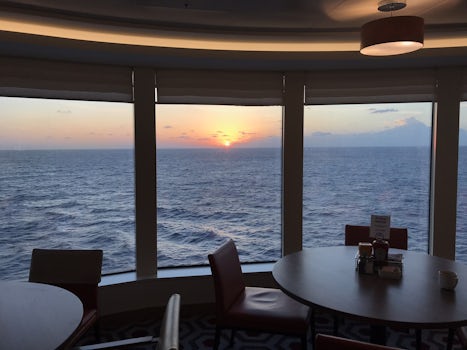 Sunrise from aft corner of Garden Cafe — the buffet on Deck 16 aft.  Alwa