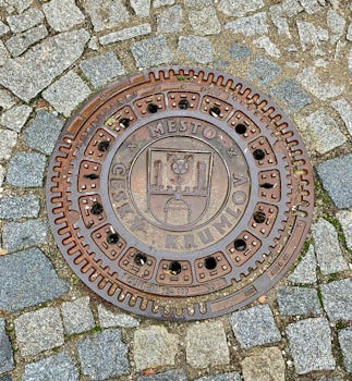 A manhole cover in Český Krumlov, Czech Republic.