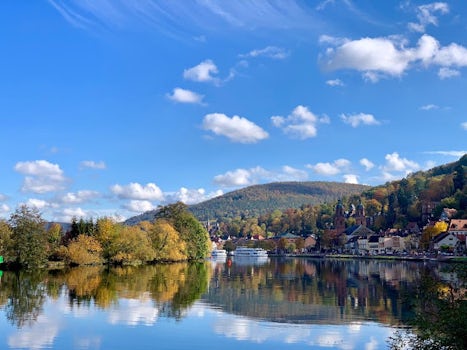 The small village of Miltenberg, Germany reflected in the Main River.