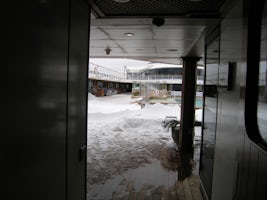 This is the pool deck looking out from the access doors on deck 12.  