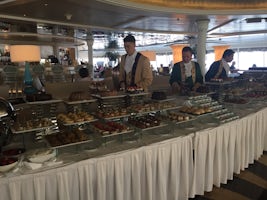 Setting up the Mozart Tea buffet in the Palm Court.