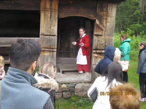Kristiansand Open Air Museum Guide donning period costume
