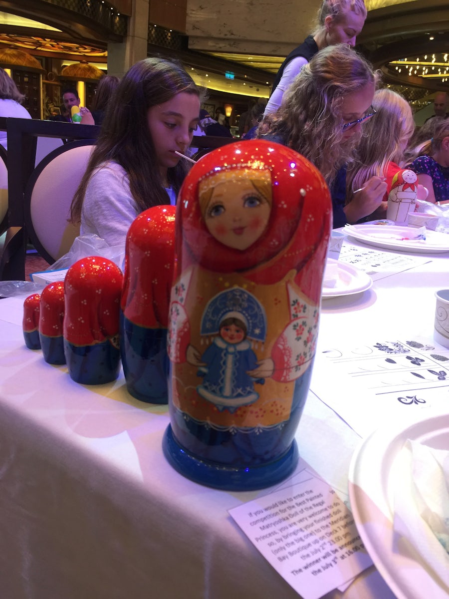 Russian doll painting activity on board