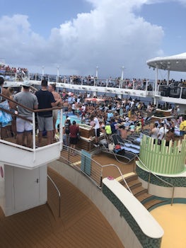 A very crowded pool deck during the belly flop competition. 