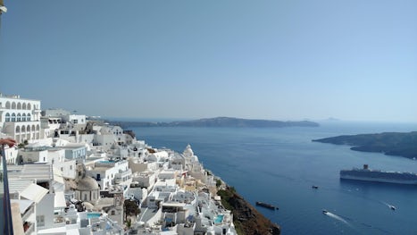 A view of the Aegean Sea while dinning in the villas of Santorini, Greece.