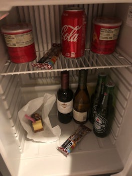 Mini bar on arrival.Missing $110.00 in goods. piece of cake with fork in it