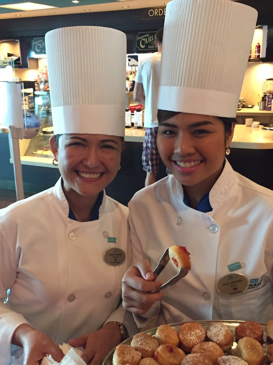 Wonderful Filipino staff, greeting and serving pastries 