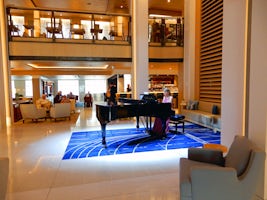 Viking pianist, Olga, on the Steinway piano in The Atrium with daily perfor
