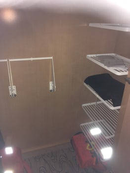 The inside of the wardrobe, not big enough for a two week cruise
