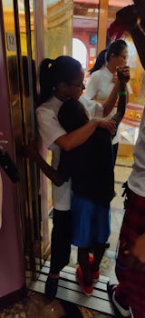 Carnival's spa staff hugging my son, apologizing.