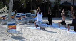 Yoga on the beach at Castaway Cay.